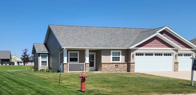 307 14th St N, Cold Spring, MN 56320 - craftsman inspired home featuring brick siding, an attached garage, a front lawn, and concrete driveway