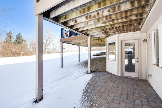 view of snow covered patio