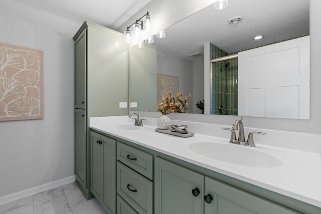 bathroom featuring vanity and an enclosed shower