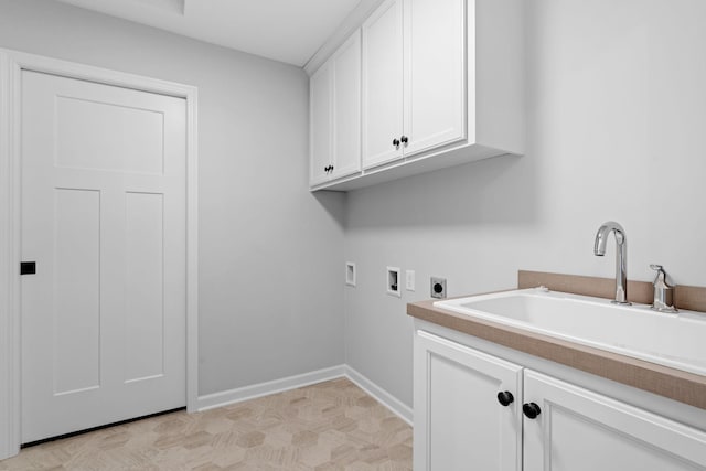 laundry room with washer hookup, cabinets, electric dryer hookup, and sink