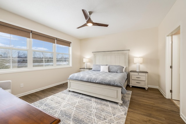 bedroom with ceiling fan and dark wood-type flooring