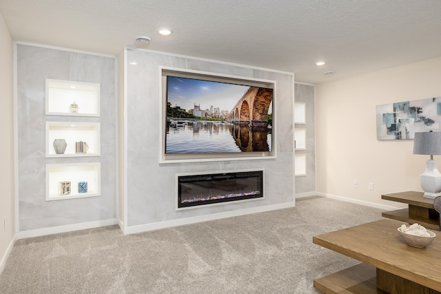 living room featuring a textured ceiling and carpet flooring