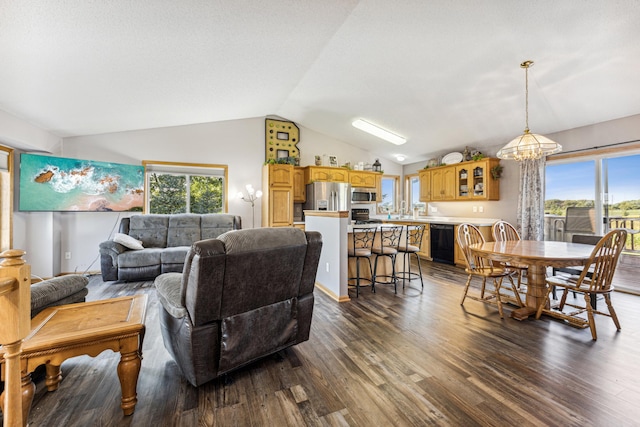 living room featuring lofted ceiling, dark hardwood / wood-style floors, an inviting chandelier, and a textured ceiling