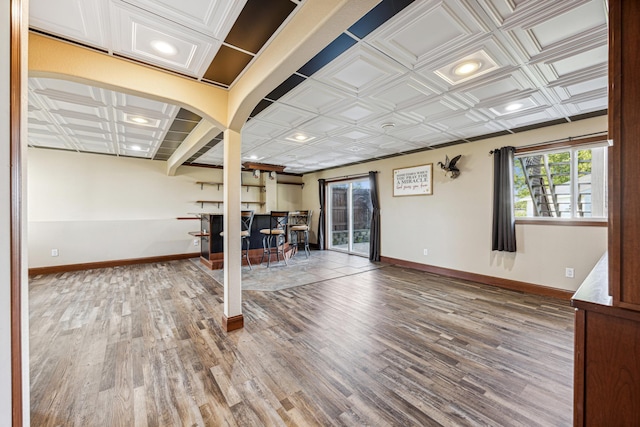 basement featuring wood-type flooring