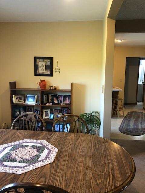 dining space featuring carpet floors