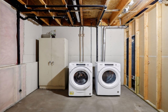 basement featuring washer and dryer