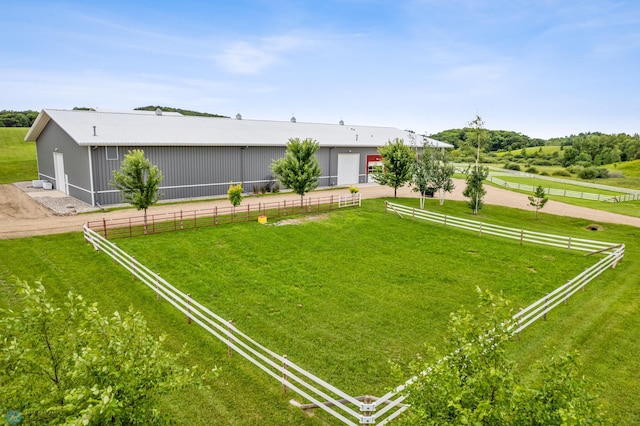 view of yard with a rural view