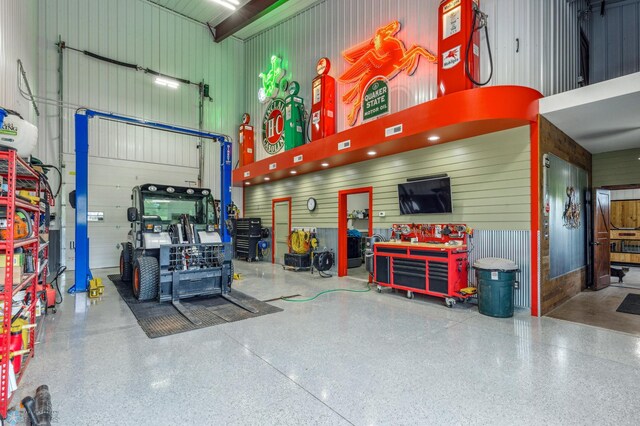 25002 State Highway 108, Lida Twp, MN 56572 - garage featuring wood walls and visible vents