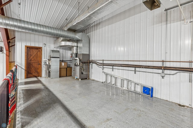 25002 State Highway 108, Lida Twp, MN 56572 - garage featuring heating unit and metal wall