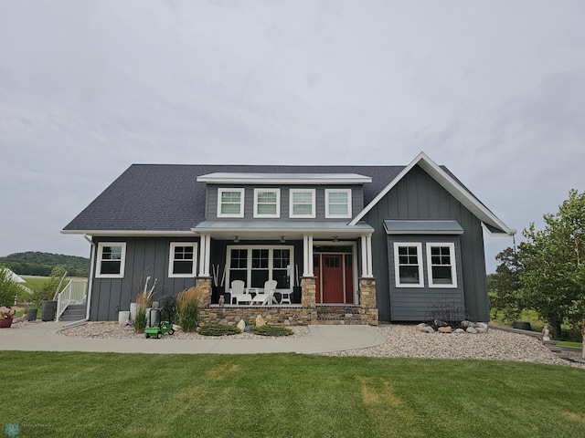 25002 State Highway 108, Lida Twp, MN 56572 - craftsman house featuring covered porch, a front lawn, and board and batten siding