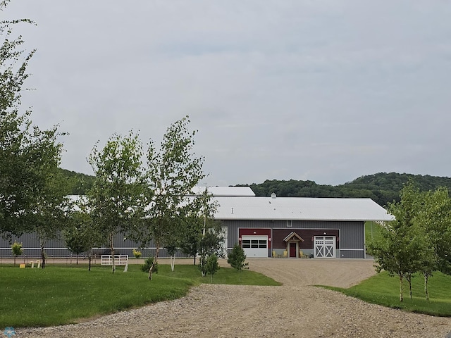 25002 State Highway 108, Lida Twp, MN 56572 - ranch-style house featuring dirt driveway, metal roof, an outbuilding, and a front lawn