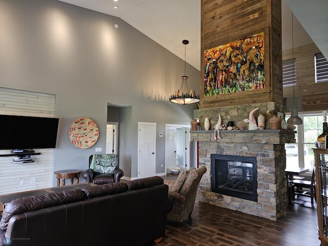 25002 State Highway 108, Lida Twp, MN 56572 - living area with baseboards, wood finished floors, a fireplace, and high vaulted ceiling