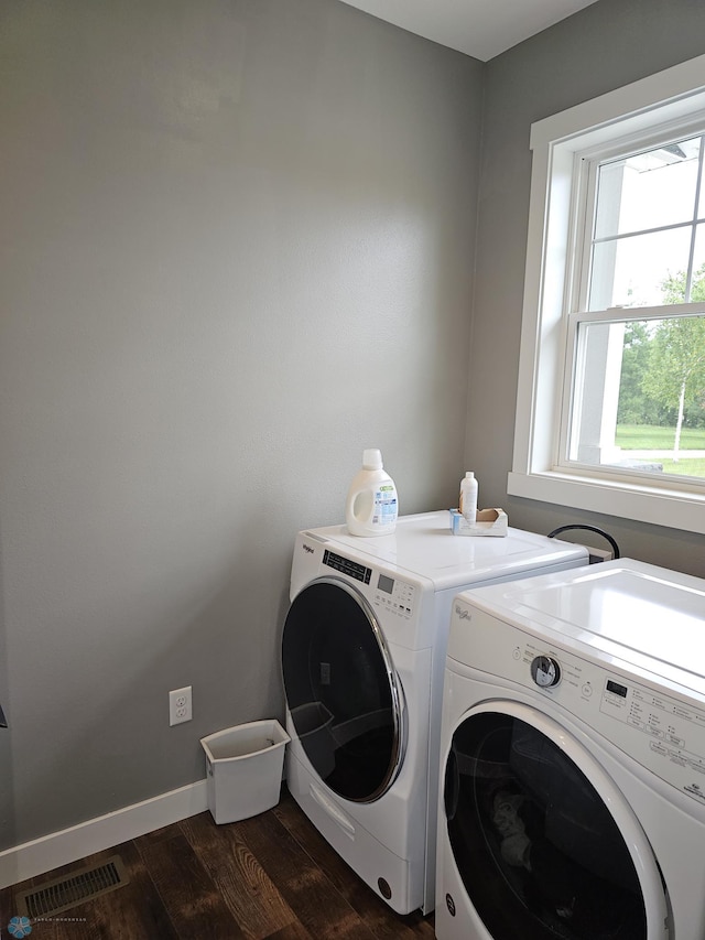 25002 State Highway 108, Lida Twp, MN 56572 - laundry area featuring washing machine and dryer, baseboards, dark wood-style flooring, visible vents, and laundry area