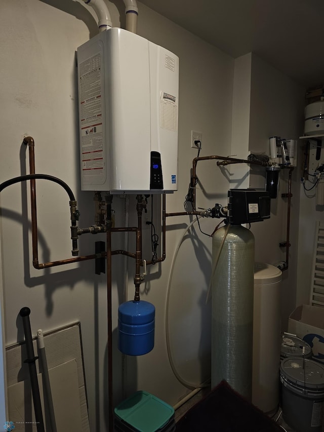 utility room with water heater