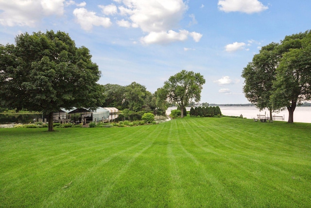 view of yard with a water view