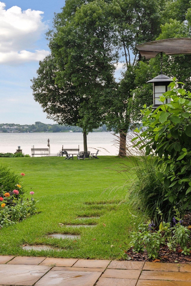 view of yard with a water view