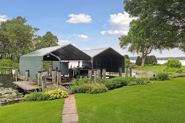 exterior space featuring boat lift and a dock