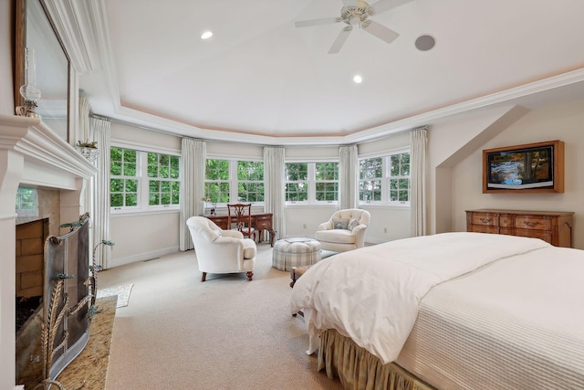 bedroom featuring baseboards, recessed lighting, a high end fireplace, ornamental molding, and light colored carpet