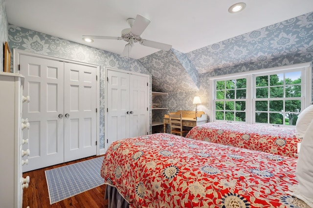 bedroom featuring wallpapered walls, multiple closets, recessed lighting, wood finished floors, and a ceiling fan