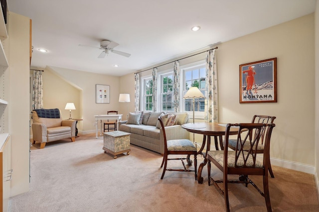 living room with ceiling fan, recessed lighting, baseboards, and light carpet