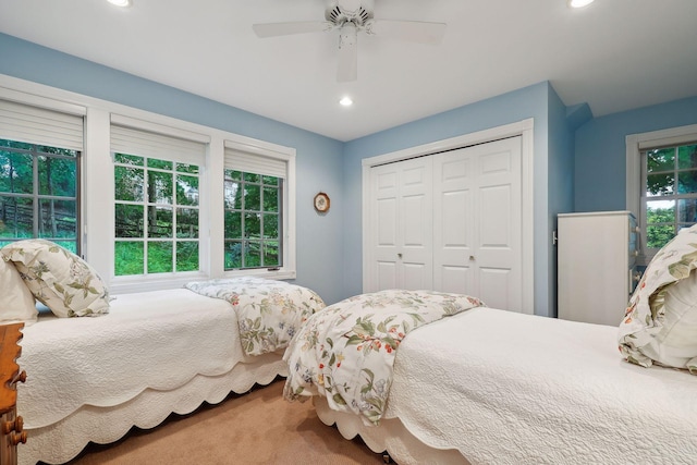 bedroom with recessed lighting, a closet, carpet, and ceiling fan