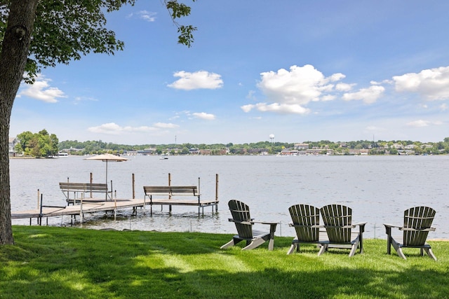 2670 Woolsey Ln, Woodland, MN 55391 - dock area featuring a lawn and a water view