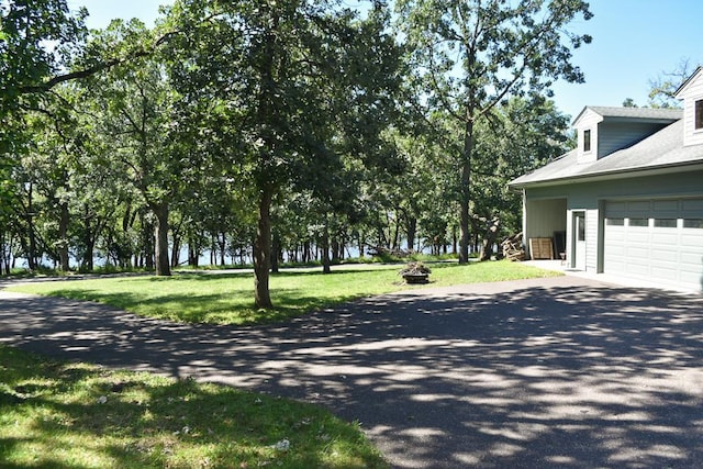 exterior space with a garage