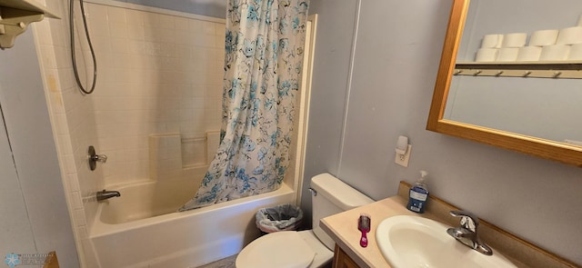 full bathroom featuring vanity, toilet, and shower / bath combo with shower curtain