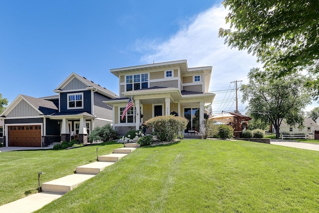 view of front facade featuring board and batten siding, a front yard, and an attached garage