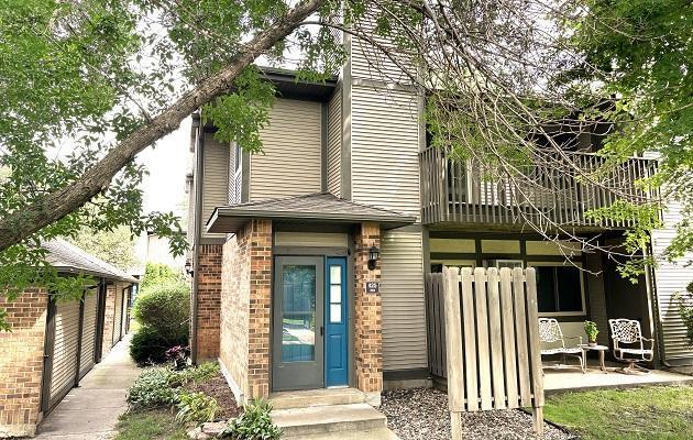 view of front of property with brick siding