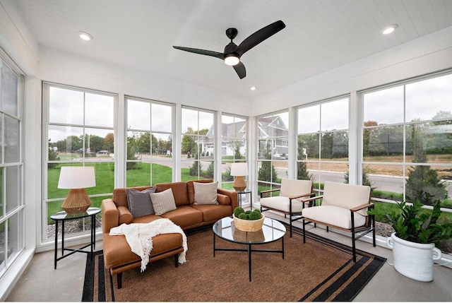 sunroom with ceiling fan and a wealth of natural light