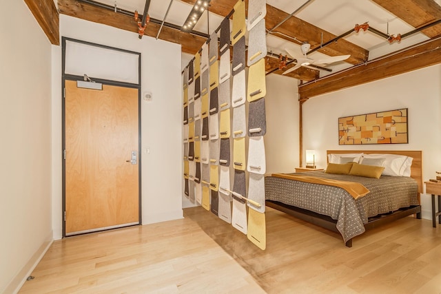 bedroom featuring ceiling fan and light hardwood / wood-style floors