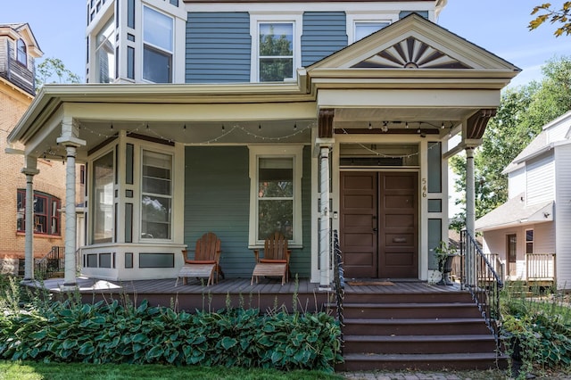 entrance to property with a porch