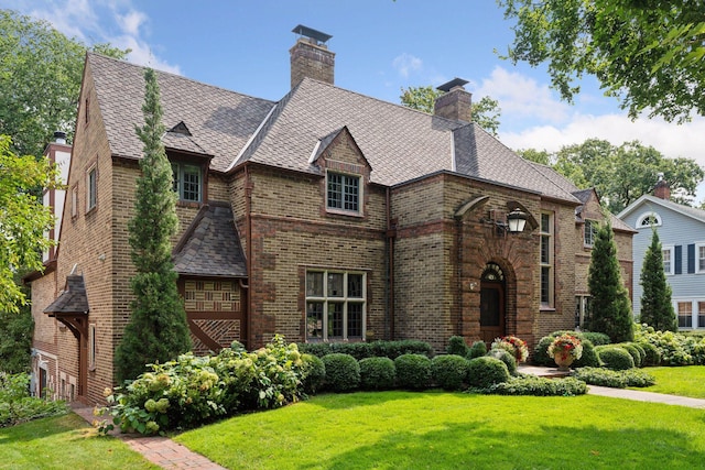 tudor house with a front yard