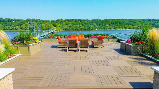 view of patio featuring a water view