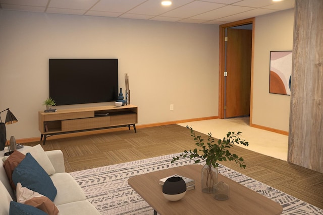 living room with carpet floors and a paneled ceiling