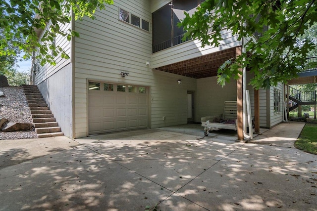 view of property exterior with a garage