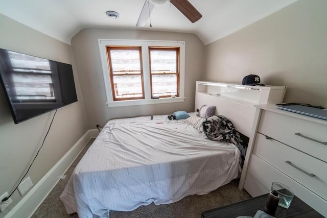 bedroom with carpet, vaulted ceiling, and ceiling fan