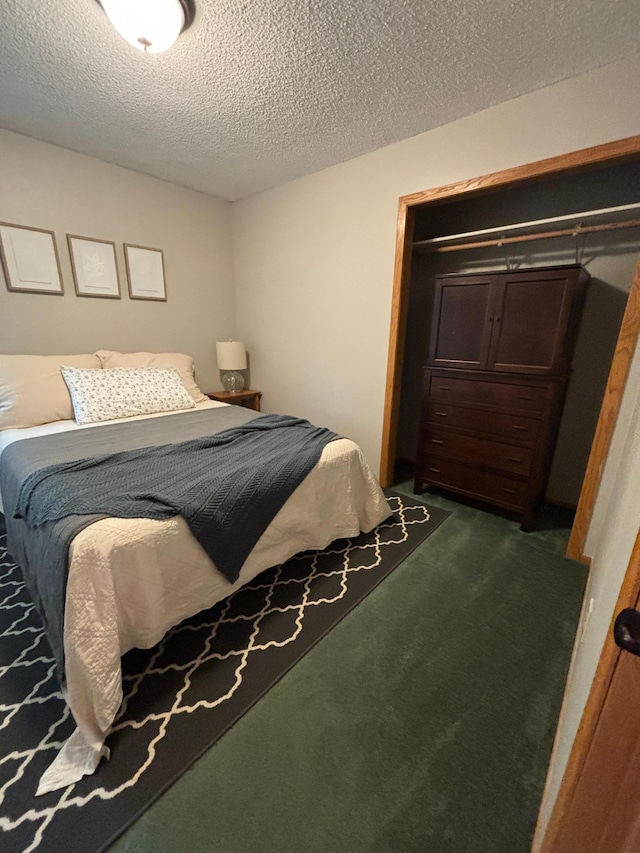 carpeted bedroom with a textured ceiling