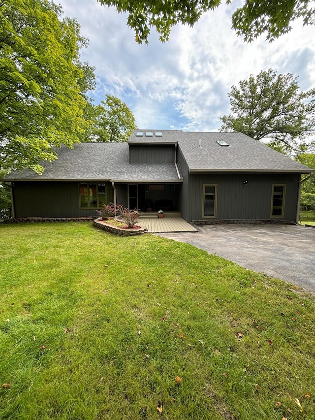 view of front of property with a front lawn and a patio