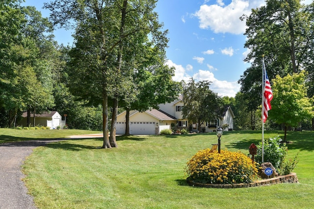 view of yard with a garage