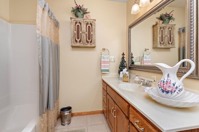 bathroom with tile patterned flooring, vanity, and shower / tub combo