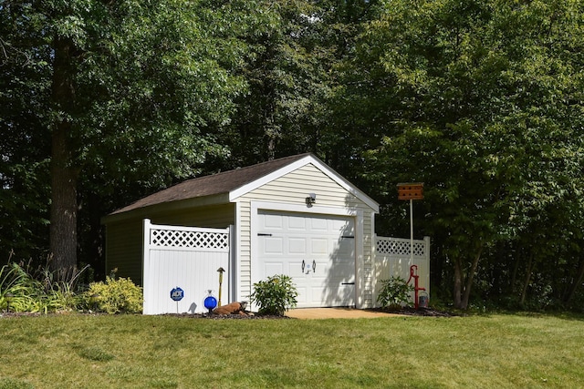 garage with a lawn