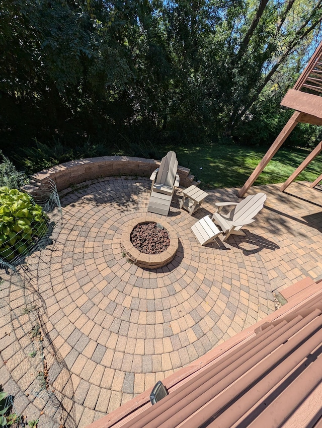 view of patio / terrace with a fire pit