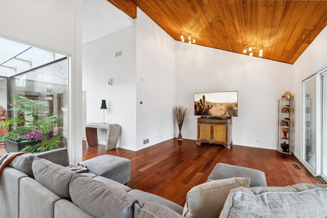 living room featuring hardwood / wood-style floors, wood ceiling, high vaulted ceiling, and an inviting chandelier