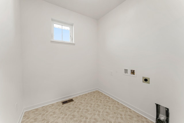 laundry room with hookup for an electric dryer, washer hookup, and light carpet