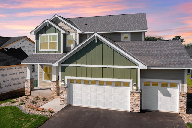 craftsman-style home featuring a garage