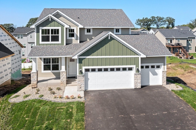 craftsman-style home featuring a garage