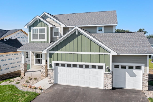 craftsman-style home featuring a garage