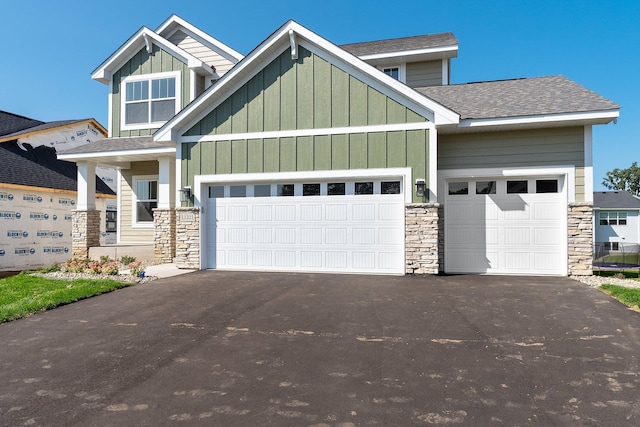 craftsman-style house with a garage